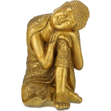 Estatua de buda con la cabeza sobre la rodilla