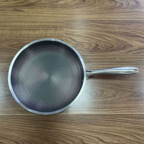 Sartén antiadherente de acero inoxidable con diseño de panal, de 24 cm, con tapa de cristal, ideal para tortillas y filetes. (1/5)
