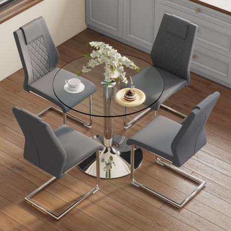 Ensemble table et chaises de salle à manger : Table de salle à manger moderne et minimaliste en verre de sécurité d’un diamètre de 85 cm, associée à 4 chaises de salle à manger avec pieds en métal arg (1/5)