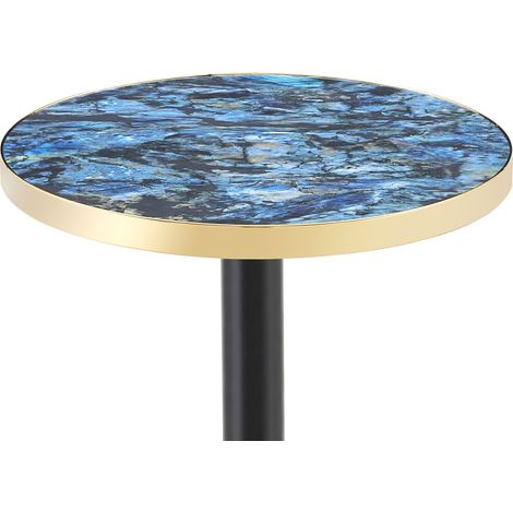 Mesa auxiliar redonda de efecto mármol azul con borde dorado y estructura metálica negra y dorada (1/5)