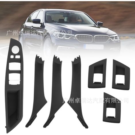 51417225873 ist ein 7-teiliges schwarzes Set inklusive Türgriffen für den Innenraum, Fensterhebern und Armlehnenbezügen für die BMW 5er Reihe. (1/4)