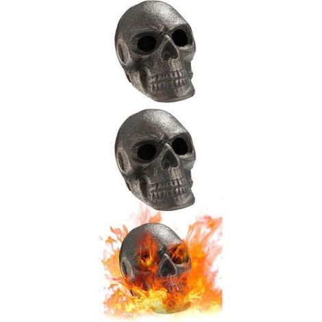 Trois pierres de lave en forme de crâne peuvent être utilisées pour créer un silex sur le thème d'Halloween pour votre cheminée. (1/5)
