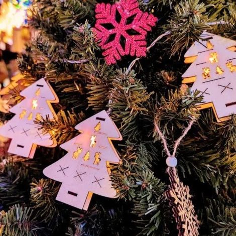 Guirlande lumineuse de Noël petits sapins en bois à piles LED ambre (1/3)
