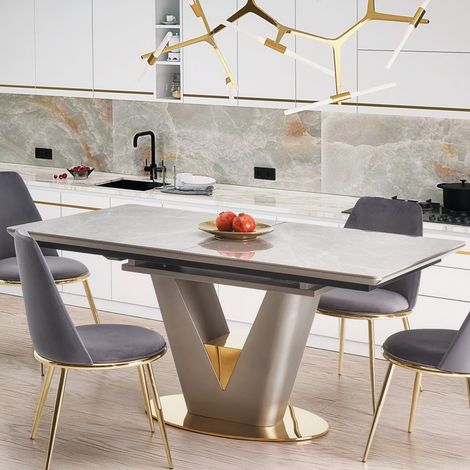 Table extensible avec plateau aspect marbre et piètement design gris et doré EAGLE
