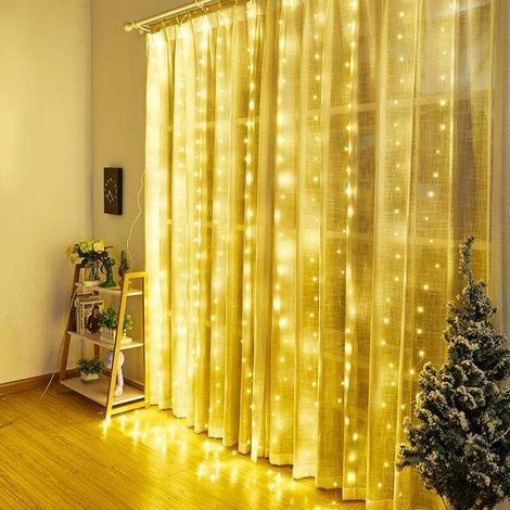 Rideau Lumineux de Noël 300 LEDs 3Mètres Alimenté par Batterie 8 Modes Télécommande Étanche pour Fenêtre Mur Fête Blanc Chaud (1/3)