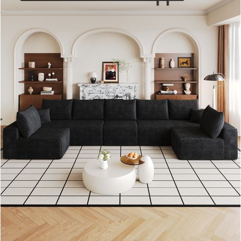 Modulares Ecksofa 425/165/83 cm in Schwarz aus Cordstoff, mit tiefer Sitzfläche (1/5)