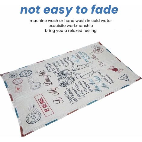 Couverture polaire double face en polyester, chaude et multifonction, idéale pour la maison ou le bureau. (1/4)