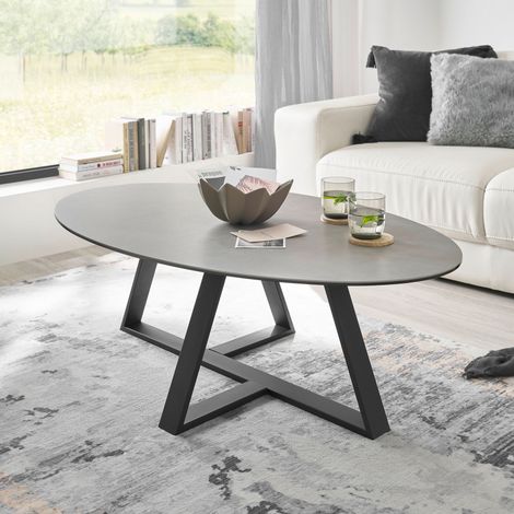 M&S – Table basse ovale 120x70x35 cm – Plateau en céramique gris – Pied en métal noir – Design élégant pour salon moderne