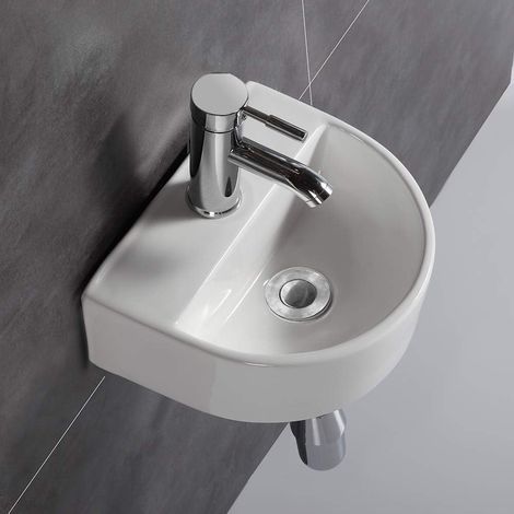 Lavabo ovale in ceramica da parete per bagni di piccole dimensioni (1/5)