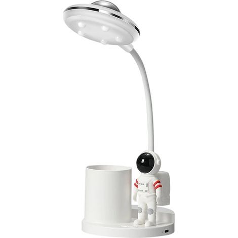 Questa lampada da scrivania, a forma di astronauta, è dotata di un portapenne, di una funzione proiettore ed è regolabile. (1/5)