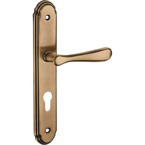 Poignée de porte Arthemis avec trou de cylindre – Acier embouti finition laiton patiné – Entr'axe 195mm – Béquille pour portes standard (1/2)