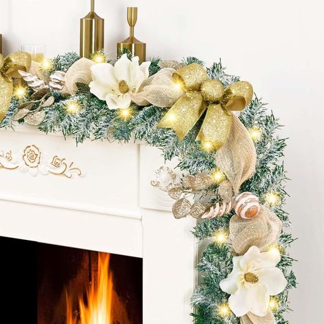 Guirlande de Noël ALOVEZ avec lumières, guirlande de Noël de luxe de 1,80 m pour cheminée, guirlande floquée de Noël avec rubans et nœuds dorés, motif magnolia, pour porte d'entrée et cheminée... (1/5)