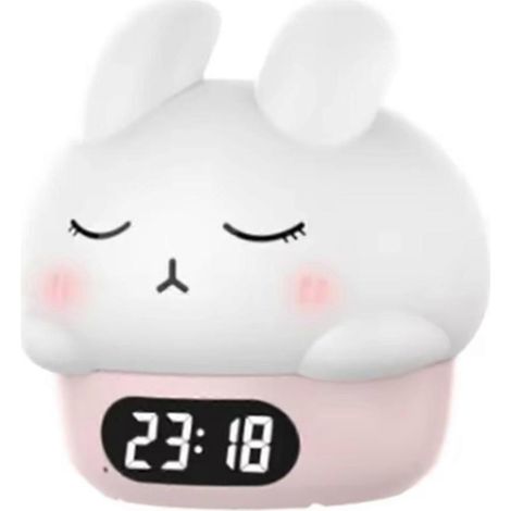 Adorable petit réveil veilleuse : Il vous accompagne jusqu'au sommeil. Un petit lapin timide tapote doucement le réveil veilleuse, idéal pour votre table de chevet. (1/5)
