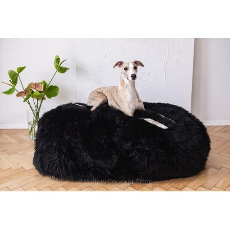 Cama ovalada de piel de oveja natural para mascotas - Negra 90 cm (1/5)