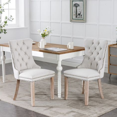 Set di 2 sedie da pranzo moderne e di alta gamma Nikki Collection, in legno massello trapuntato, rivestite in lino, con gambe in legno e borchie decorative, colore beige, DE6801BG