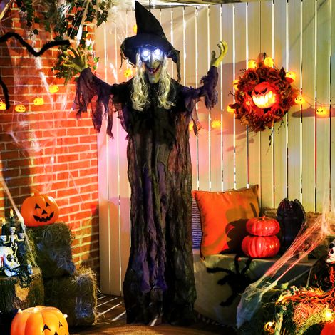 Bruja de Halloween colgante de 183 cm con luces LED, función de sonido, brazos ajustables y boca. (1/5)