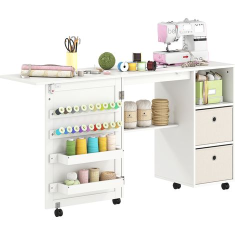 HOMCOM mesa de costura plegable con 6 ruedas, mueble para máquina de coser con 18 clavijas para hilos, 2 cajones de tela, 3 compartimentos, blanco