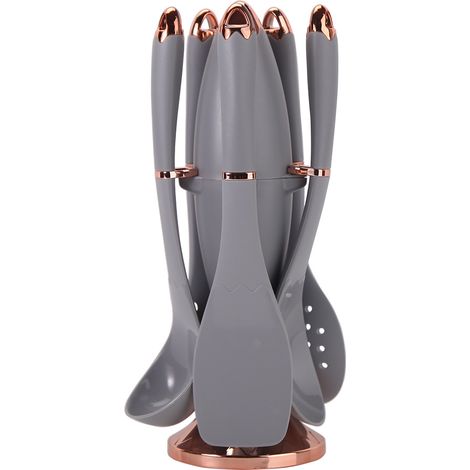 Ensemble d'ustensiles de cuisine en silicone pour la cuisson, comprenant une passoire à soupe, une spatule antiadhésive et un support de rangement pour cartouches de gaz.