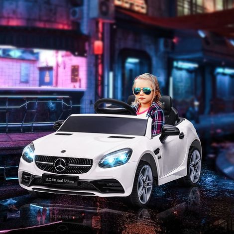 Auto elettrica per bambini AIYAPLAY, con fari a LED, cintura di sicurezza, clacson, musica, da 3 a 5 km/h, bianca, 107 x 62,5 x 44 cm