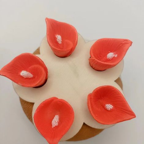 Orange-red lily-shaped bee feeder, a compact and practical device for beekeeping. - AquaForge