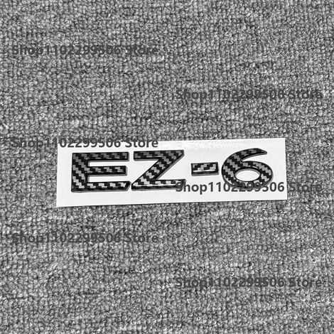 (EZ60, carbone) - Accessoires extérieurs en ABS noir argenté pour voiture Mazda : autocollant logo/lettre pour coffre. (1/5)