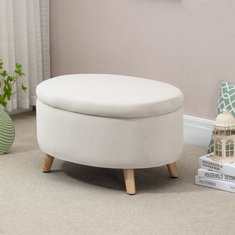Panca contenitore/sgabello, forma ovale, effetto velluto, portata massima 120 kg, dimensioni 71 x 51,5 x 42 cm, colore beige.