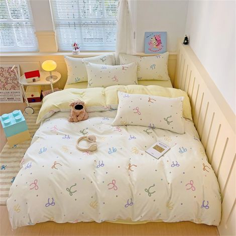 Parure de lit réversible 2 pièces en microfibre avec housse de couette de 140 x 200 cm et taie d'oreiller de 70 x 90 cm, jaune à pois, avec fermeture éclair (1/5)