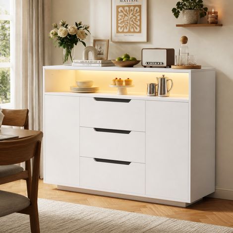 Buffet blanc moderne multifonction avec étagère ouverte, trois tiroirs et portes des deux côtés. Finition mate blanche avec rails métalliques et bords arrondis. Idéal pour le salon, la salle à manger (1/5)
