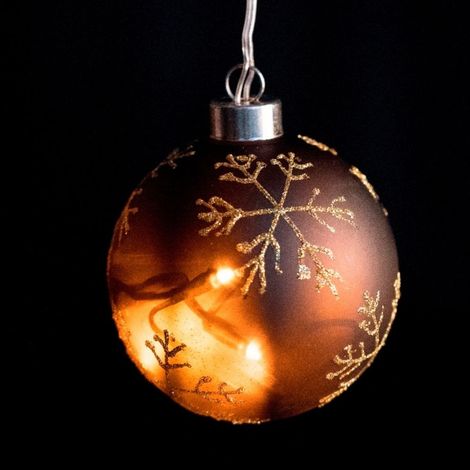Boule de Noël LED en cristal doré avec étoiles.