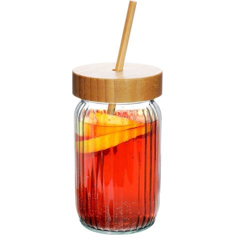 Tarro de cristal grueso con elegantes rayas y pajita de bambú.
