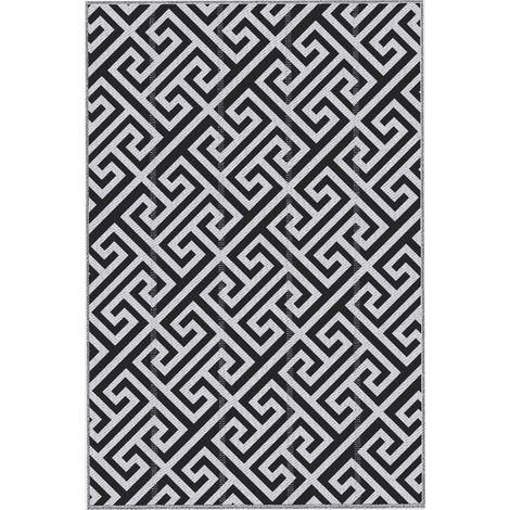 Tapis d’extérieur réversible 182 x 274 cm à motif géométrique finition imperméable blanc et noir (1/5)