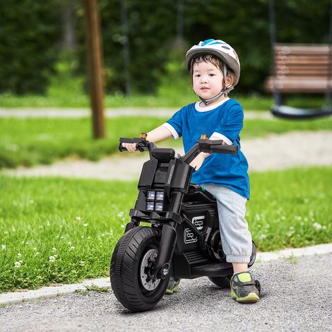 Motocicleta eléctrica de 6 V para niños con ruedines, claxon, 4 faros y música, patinete eléctrico para niños de 3 a 5 años en PP y metal, velocidad 3 km/h, 86x44x58 cm, negro