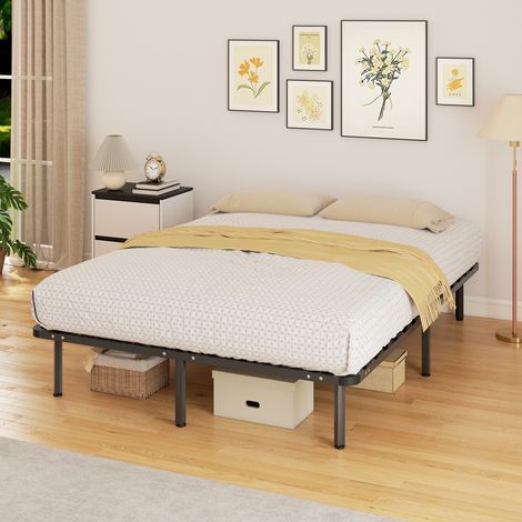 Estructura de cama de 140 x 190 cm, cama doble con somier de láminas de madera maciza y patas, con espacio de almacenamiento debajo, color negro. (1/5)