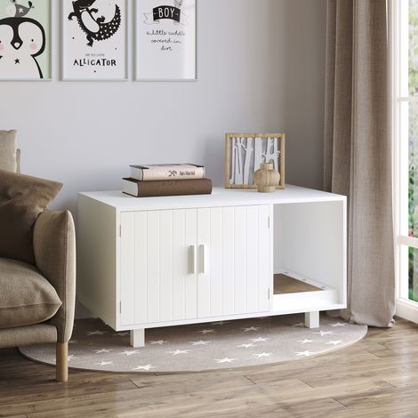 Mueble de madera para arenero de gato con 2 puertas y abertura lateral con rascador, color blanco.