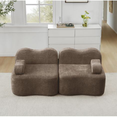 Sofá modular marrón de terciopelo con asiento profundo y puf conectable (1/5)