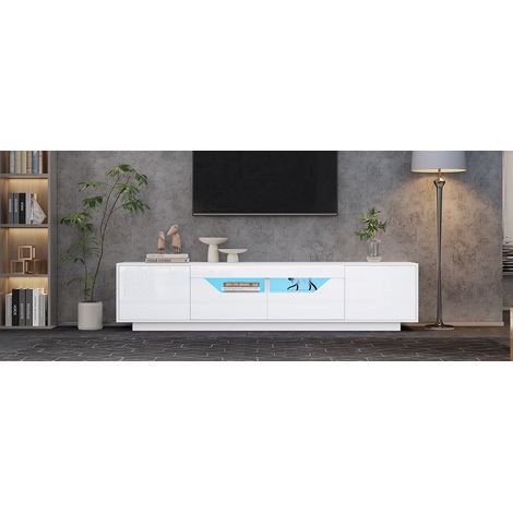 Armoire de télévision de 1804045 cm. C’est un meuble bas qui dispose de 2 compartiments et 2 étagères. L’armoire est en finition polie. Elle est conçue pour accueillir des téléviseurs de 75 pouces. Co (1/5)
