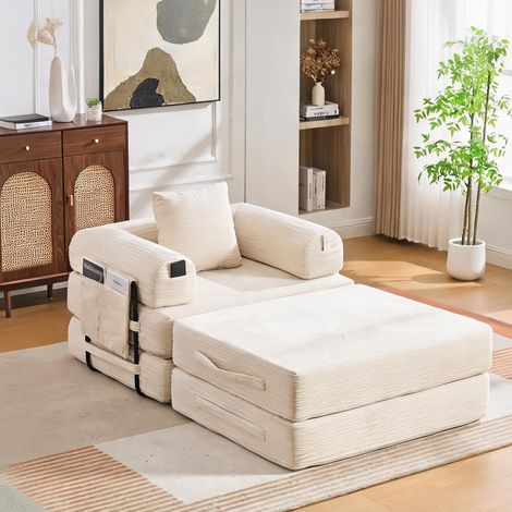 Fauteuil lounge beige avec pouf structure métallique et coussin (1/5)