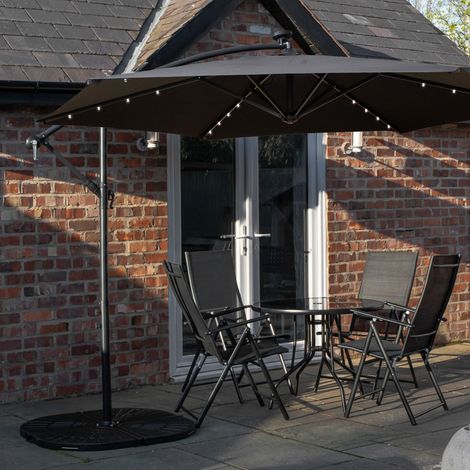 Outdoor 4 Person Round Glass Top Garden Dining Table Chairs With Black Banana Lit Parasol and Base Set (1/5)