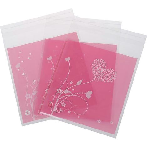 100 lila herzförmige Beutel gefüllt mit Süßigkeiten und Keksen (Geschenk). (1/3)
