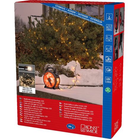Konstsmide 3832-107 - Catena luminosa con micro LED con avvolgicavo, 200 diodi bianchi caldi, trasformatore esterno 30 V, 3,6 W, cavo morbido nero (1/5)