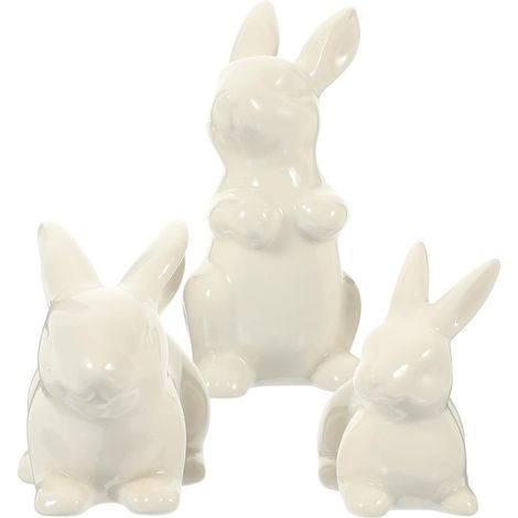 White ceramic rabbit figurine with a frosted matte finish, modern and minimalist decoration for an office or dining room (1/5)