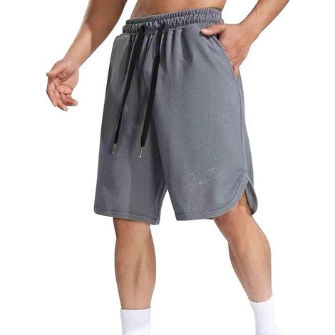 Short homme uni, taille élastique avec cordon de serrage, coupe décontractée, parfait pour basket, jogging, sport et loisirs. (1/5)