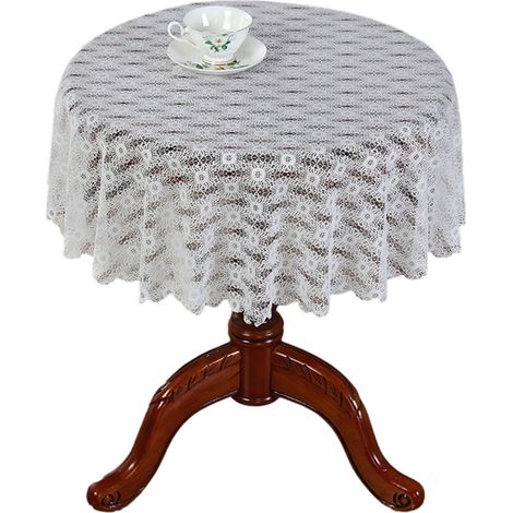 Nappe ronde en dentelle blanche, une décoration de table élégante, adaptée au bureau et à la maison, et qui peut être associée à des motifs floraux.