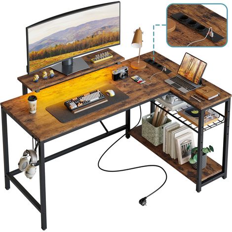 Bureau d'angle en L Bestier 132 cm avec prises et éclairage LED, réversible, avec étagères, grand poste de travail pour ordinateur et crochets, idéal pour le bureau à domicile et la chambre. (1/4)