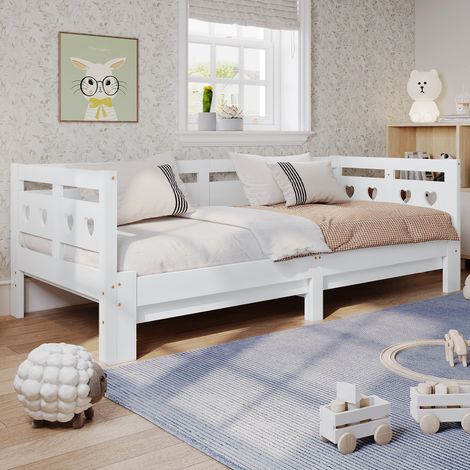 Lit banquette 90x200 cm en pin massif blanc, extensible avec second couchage et sommier à roulettes, motif cœur