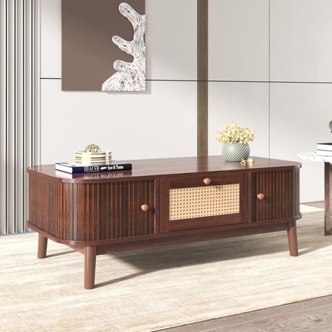 Table basse en rotin marron et naturel  2 tiroirs et 2 portes en bois massif  Dimensions 124x64x14 cm  Style rustique élégant (1/5)