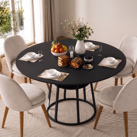 Tavolo da pranzo rotondo da 120 cm per 4-6 persone, in MDF e metallo con ripiano portaoggetti, nero (1/5)