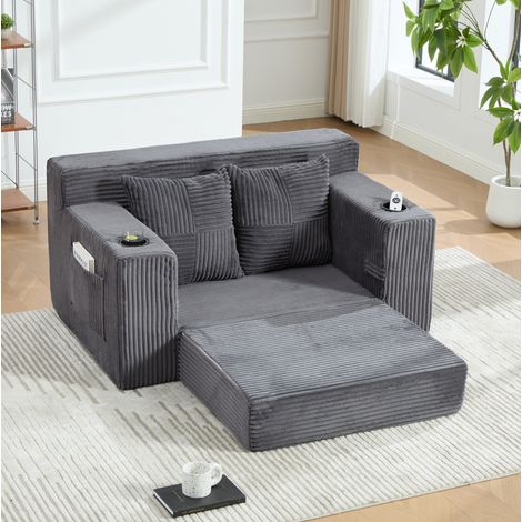 Divano pouf 151/133/64 cm grigio in velluto a coste con 2 cuscini e tasche laterali (1/5)