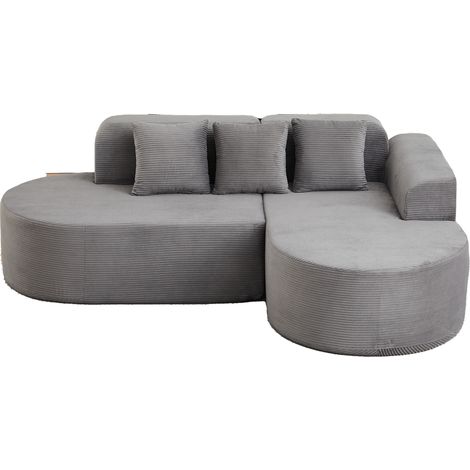Divano modulare a L da 220 cm in velluto a coste grigio, con schienale e braccioli curvi (1/5)