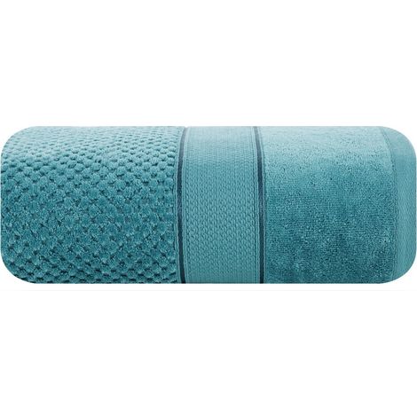 Asciugamano Jessi 50x90 cm in spugna turchese 500 g/m2 con trama a quadri in rilievo e bordo in velluto.
